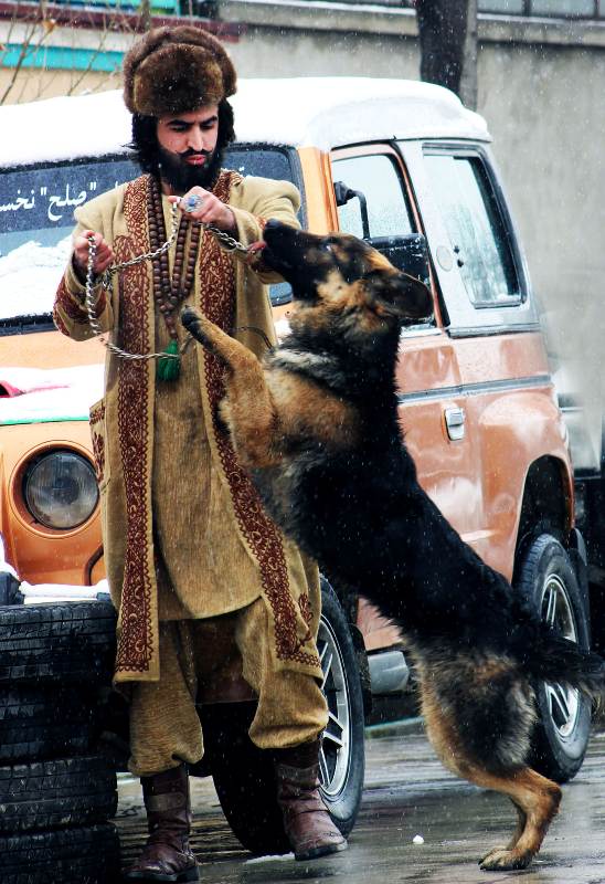 Ajmal Haqiqi with his pet dog