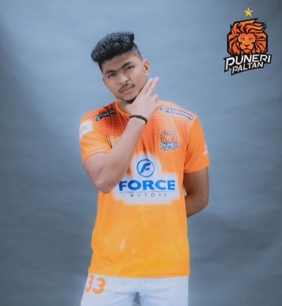 Akash Shinde while posing for his team Puneri Paltan during PKL Season 11