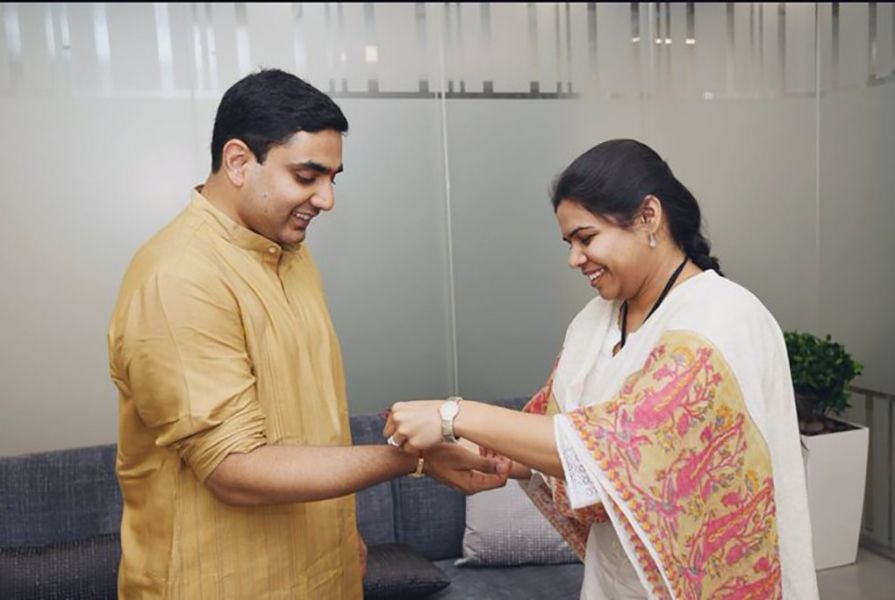Akhila Priya Tying Rakhi to Lokesh Nara