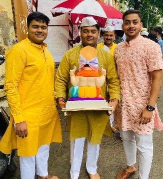 Akshay Jaywant Bodake while worshipping Lord Ganesha