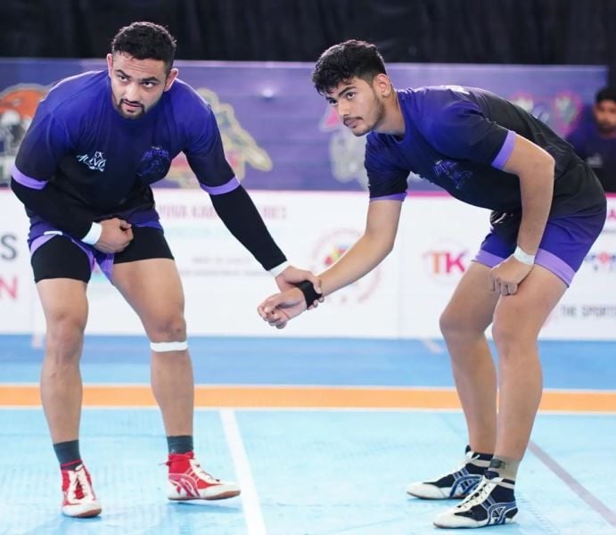 Akshit Dhull (right) during a match in the Yuva Kabaddi Series