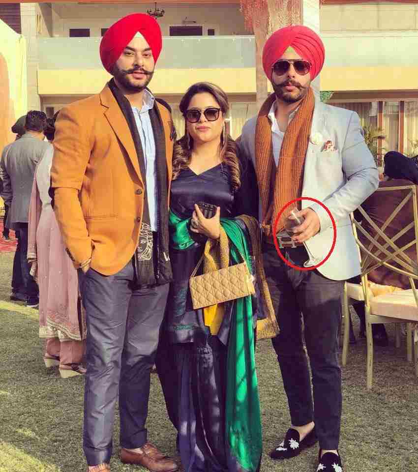 Alam Makkar with a glass of wine