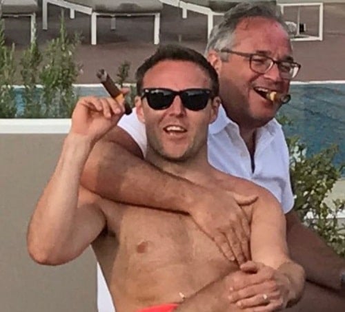 Alan Halsall holding a cigar