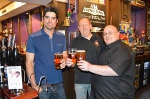Alastair Cook (left) drinking beer