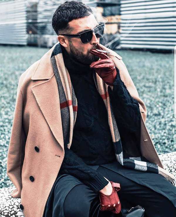 Alaudin Hamiti while smoking