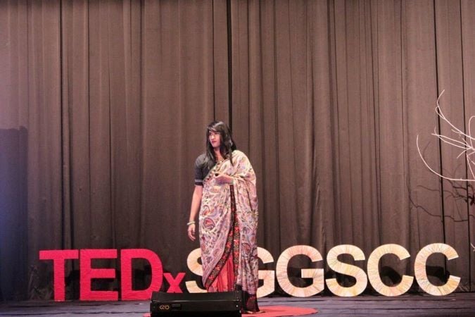 Alex Mathew (Maya the Drag Queen) speaking at a TEDx Event