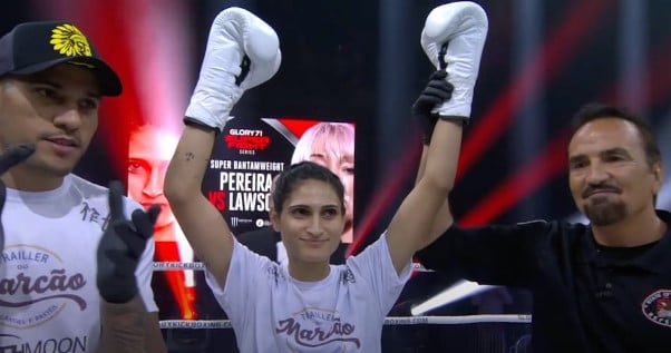 Alex Pereira while cheering up his younger sister after she won a match