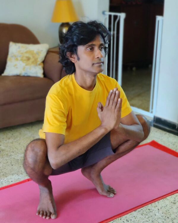 Alexander Babu practicing yoga