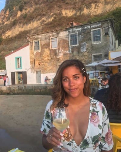 Alexi McCammond drinking wine