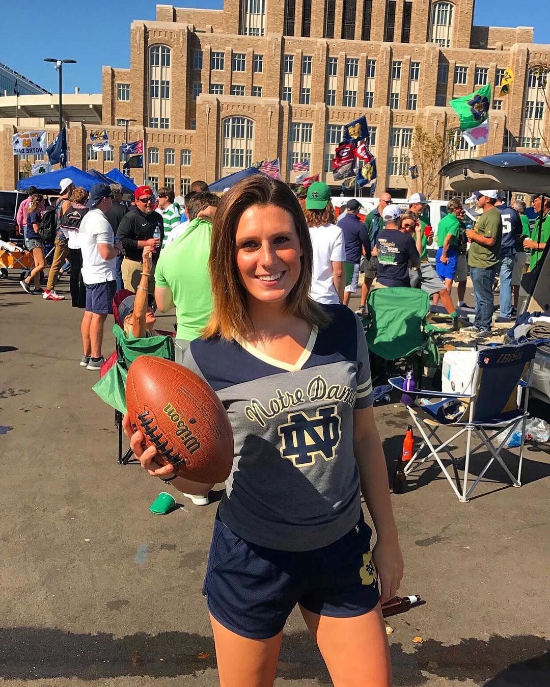 Alexis McAdams posing with a baseball