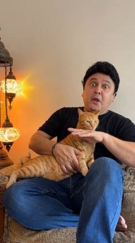 Ali Asgar with his pet cat