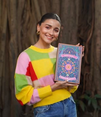 Alia Bhatt holding a box of Phool