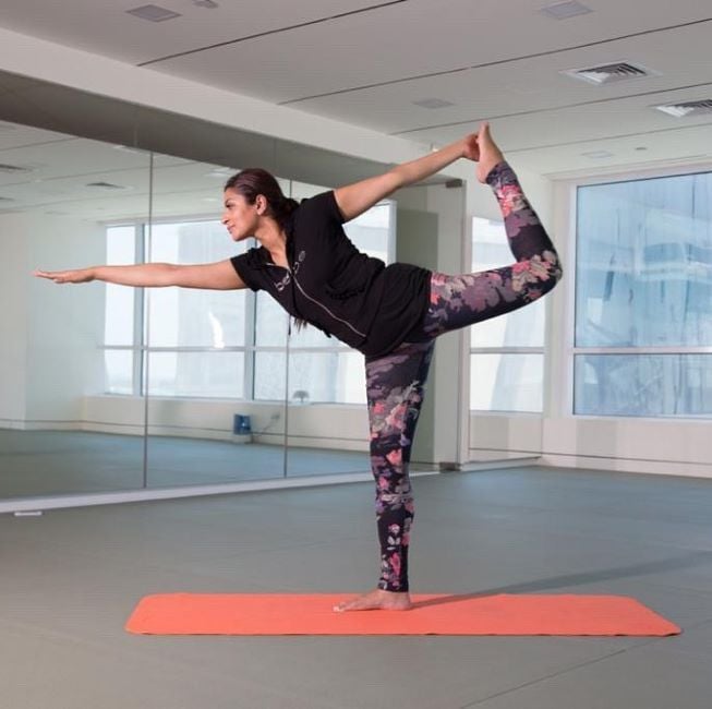 Alisha Moopen practising yoga
