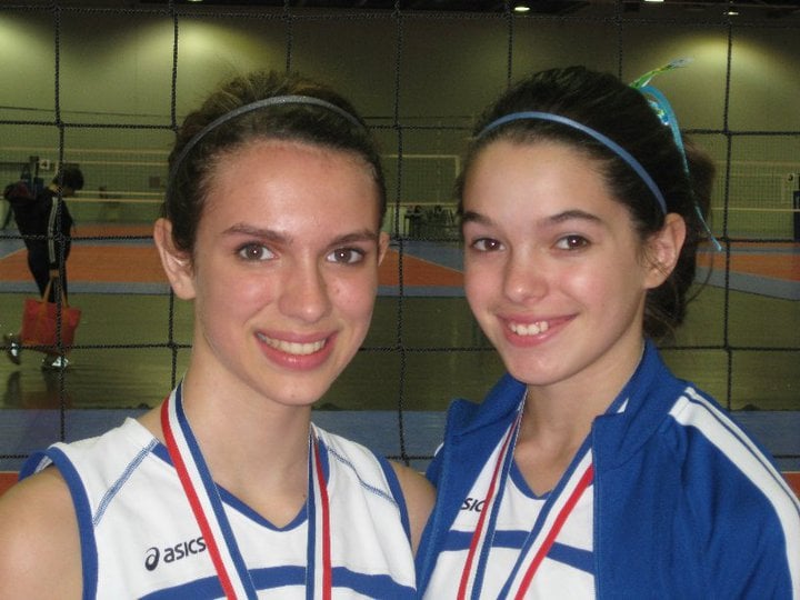 Ally Lewber (right) after winning a medal at a local volleyball competition