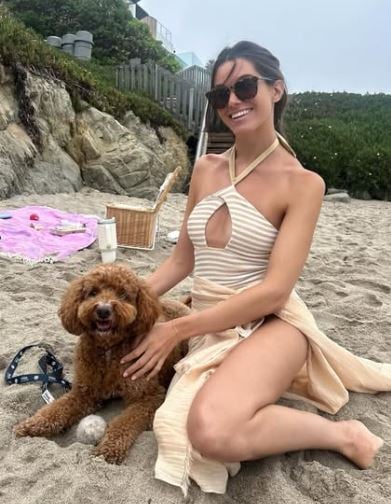 Ally Lewber with her golden poodle