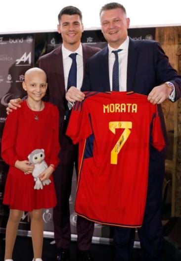 Alvaro Morata (middle) during a program of his charity foundation