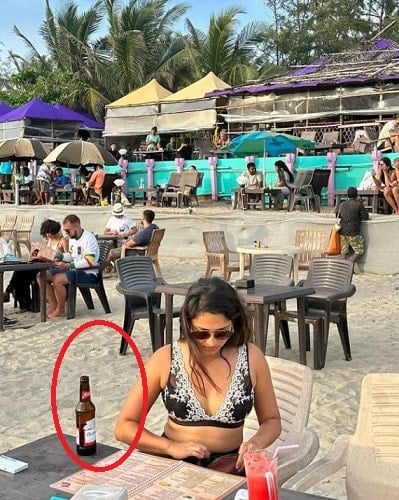Amala Paul with a bottle of beer