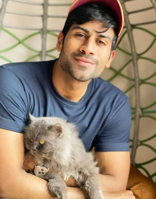 Aman Maheshwari with his pet cat, Popo 