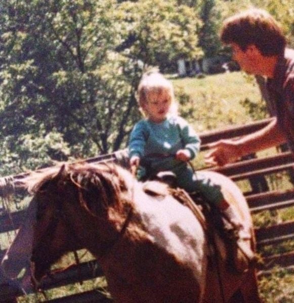 Amber Heard in her childhood with her father doing horse riding