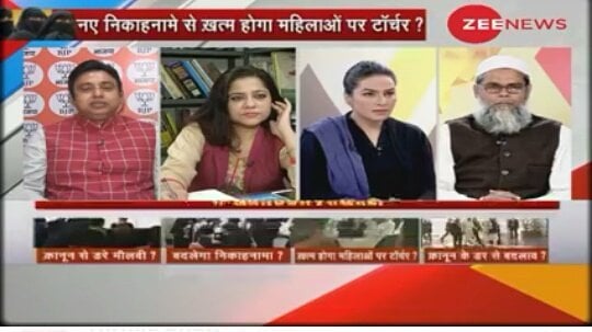 Amber Zaidi taking part in a debate on Zee News
