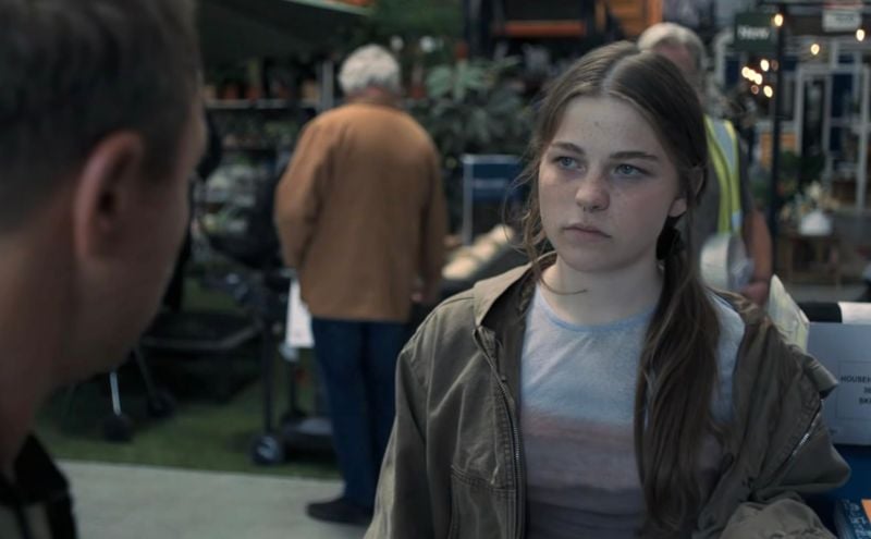 Amelie Pease in a still from the British crime drama TV miniseries titled