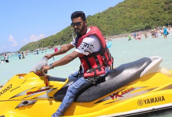Amir ADS doing water sports during one of his trips