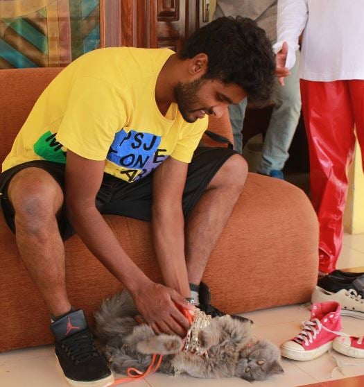 Amir ADS posing with a cat