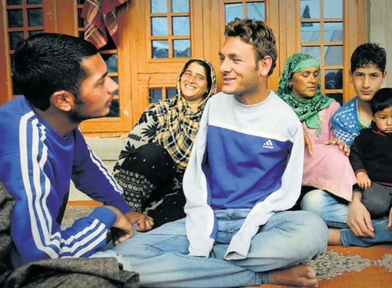 Amir Hussain Lone with his family