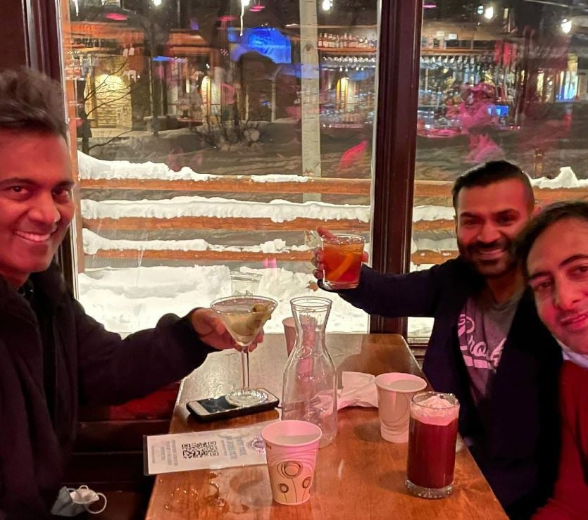 Amish Shah at a restaurant with his friends