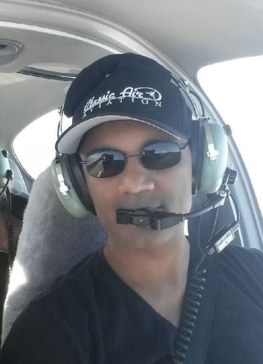 Amish Shah flying a small airplane
