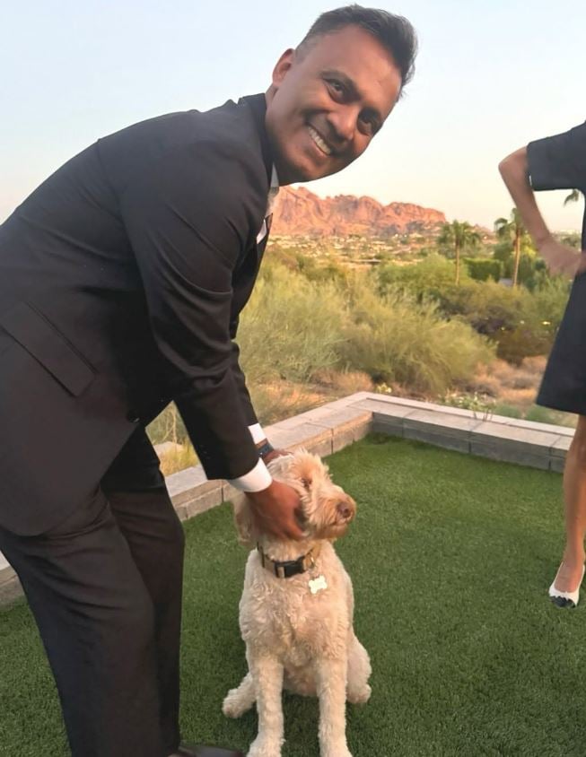 Amish Shah with a dog