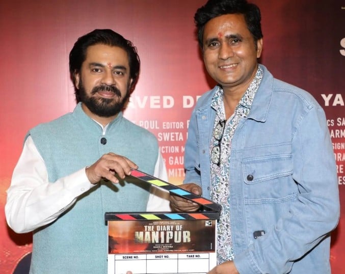 Amit Rao (left) posing with film director Sanoj Mishra during the announcement of the film The Diary of Manipur