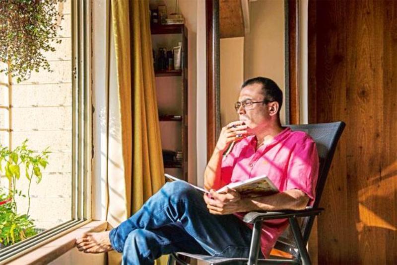 Amitabh Bhattacharya writing lyrics of a song