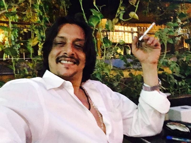 Amitabh Dayal smoking