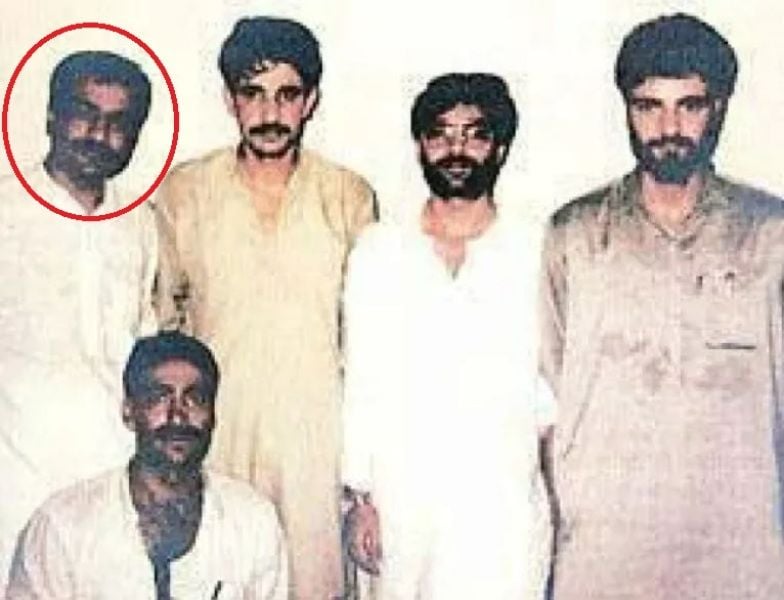 An image from the meeting between Tiger Memon (extreme left - standing), Usmaan, Hilal Baig, and others in Karachi, 1993