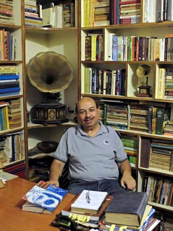 Shashi Kumar Keswani in his office full of books and his gramophone
