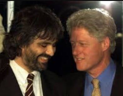 An old picture of Andrea Bocelli with Bill Clinton
