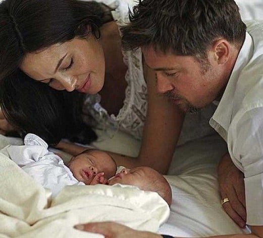 An old picture of Angelina Jolie and Brad Pitt with their twins