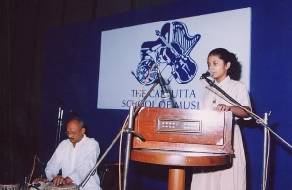 An old picture of Antara Mitra singing at an event organised at The Calcutta School of Music