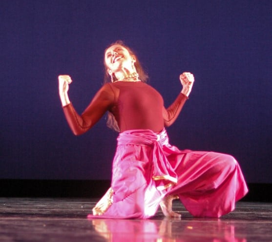 An old picture of Antonia Minnecola while performing kathak on stage