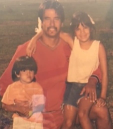 An old picture of John Beam with his daughters