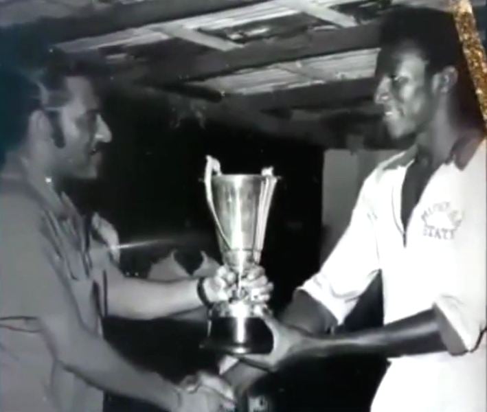 An old picture of Steve Bucknor receiving the DaCosta Cup