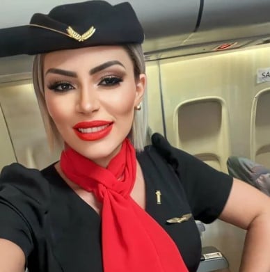 Ana Akiva as a flight attendant