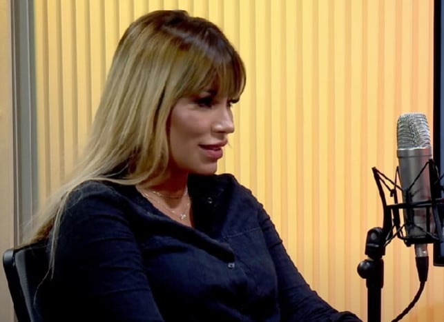 Ana Akiva speaking during a live podcast