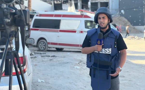 Anas Al-Sharif while reporting from the Israel-Gaza conflict