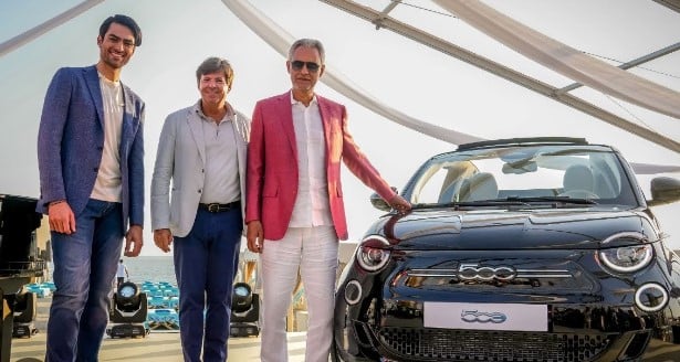 Andrea Bocelli and his son after signing a collaboration with the makers of the Fiat Nuova 500 car