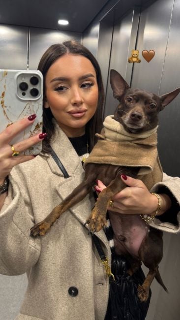 Andriana holding her dog