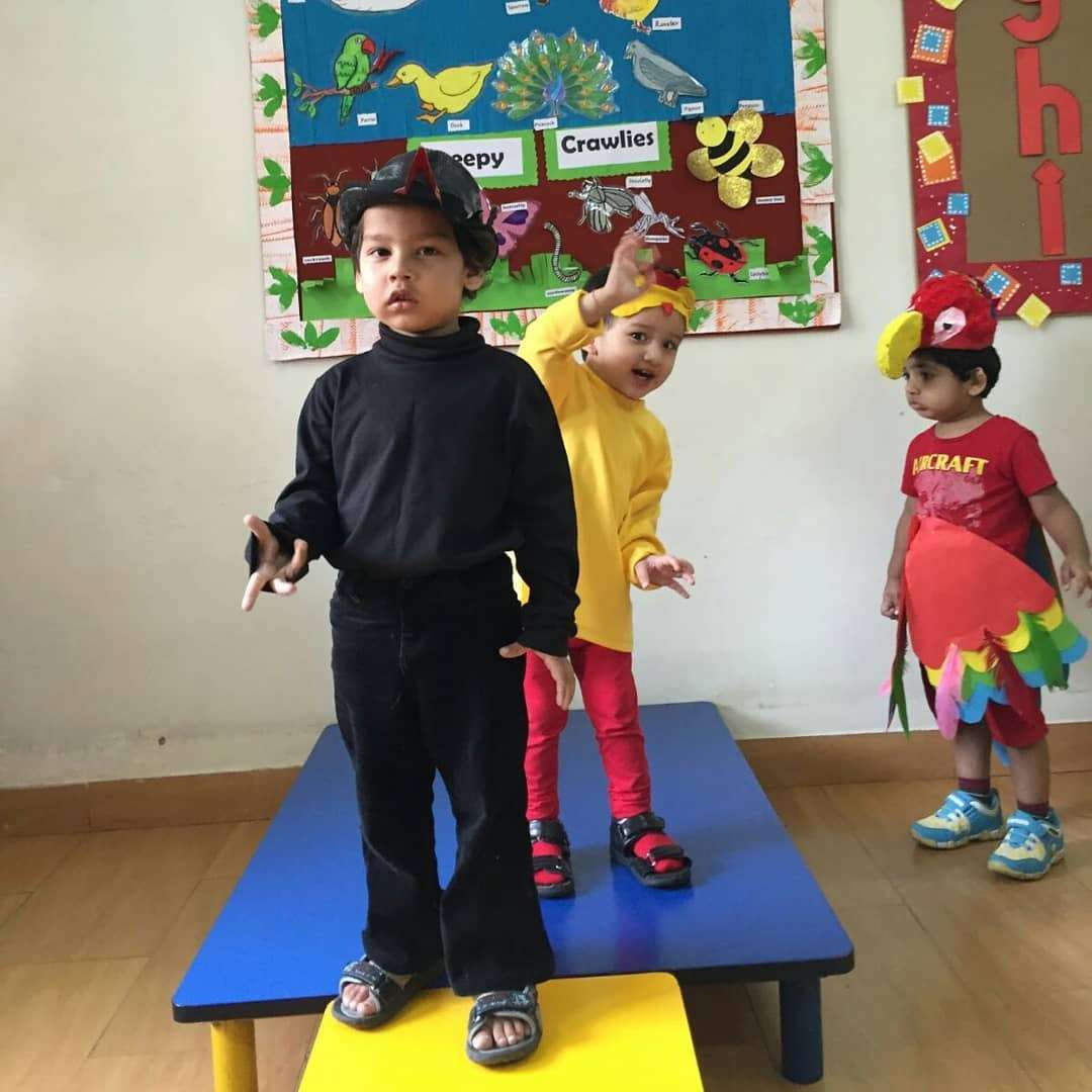 Angad Maholay (in yellow) competing in a child modeling competition