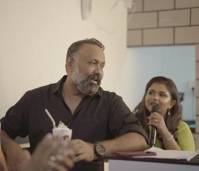 Angeline Mariya with Omar Lulu at her shop