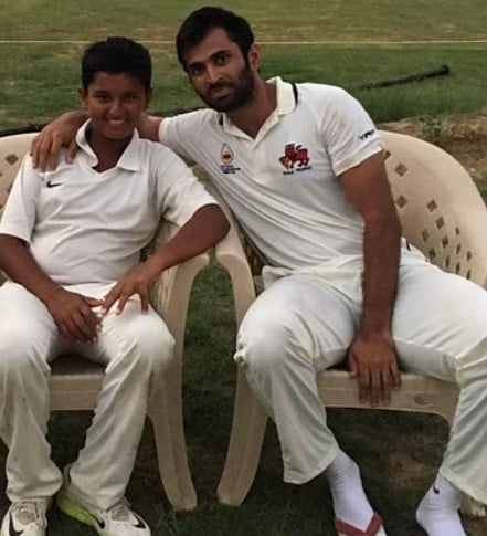 Angkrish Raghuvanshi with Abhishek Nayar (right)